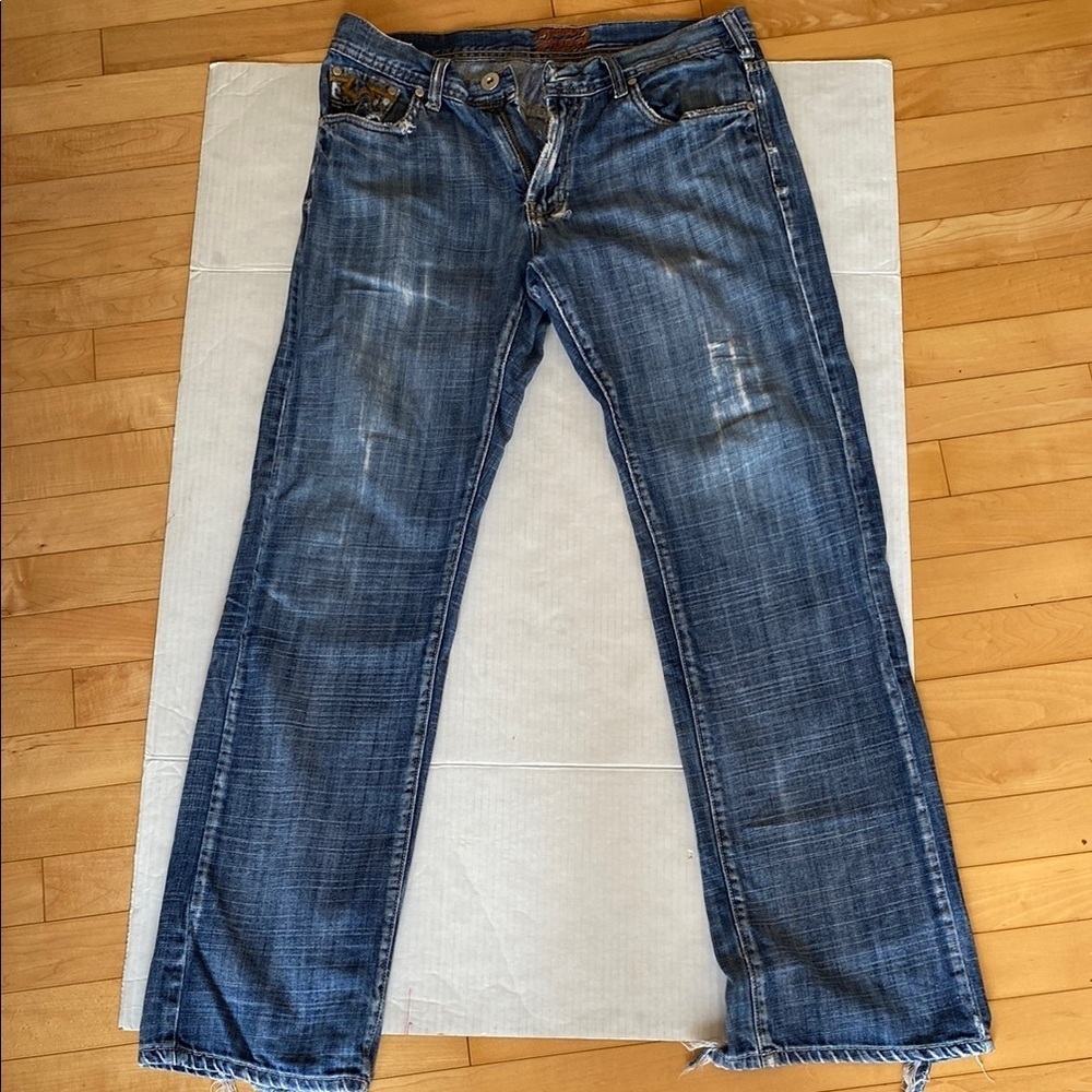 FRIED Denim Jeans that are distressed in a medium wash Jeans Size 32
